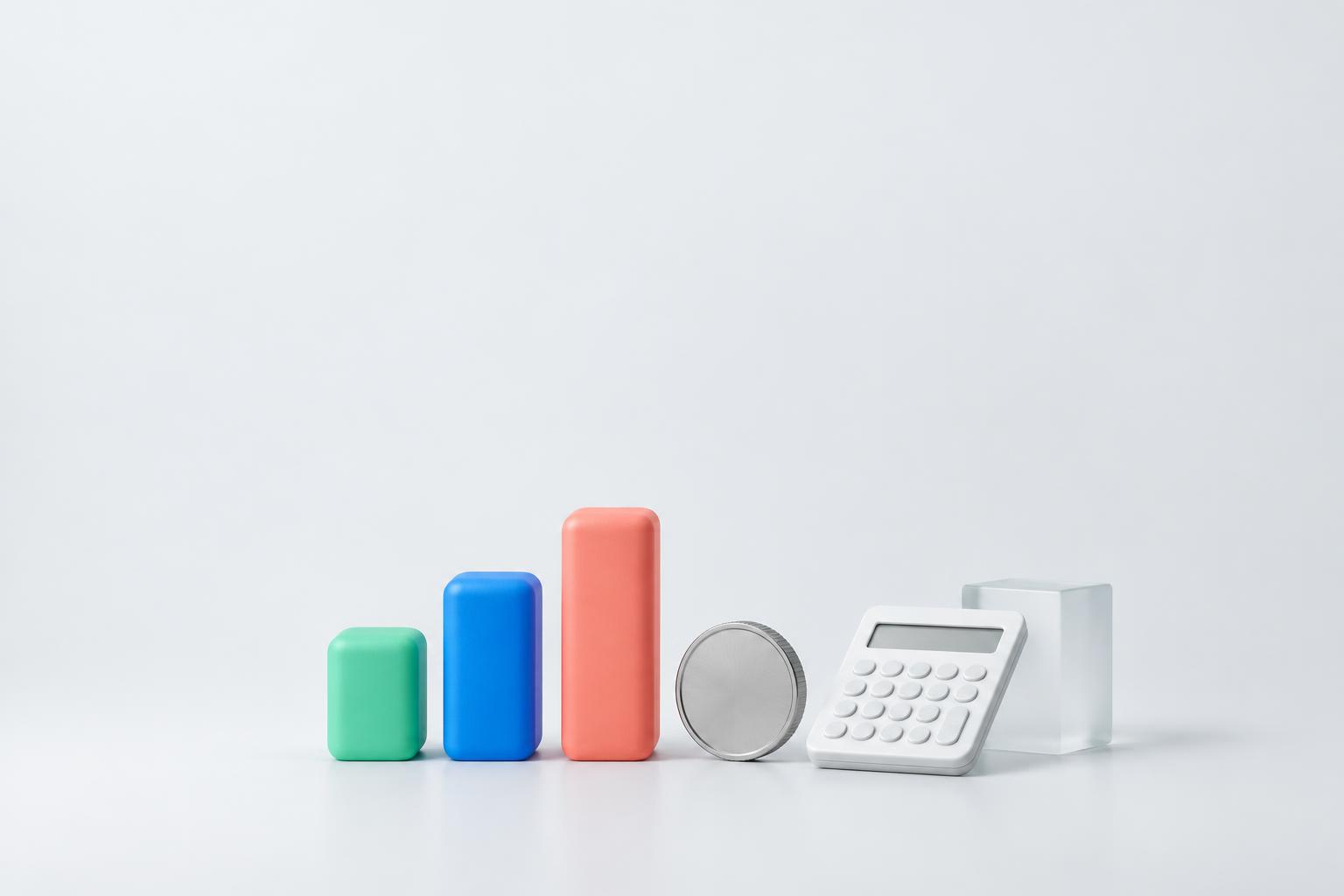 Colourful growth bars, a silver coin and a calculator